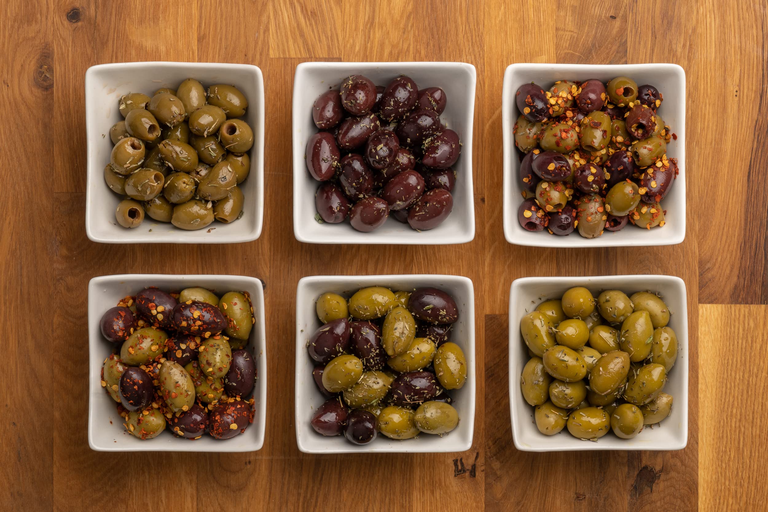 Pack of 4 Variety Mix Olives in Vacuum, 2 Greek Olive Varieties with 4 flavors, Freshly Sealed Olives with Extra Virgin Oil 4X200g